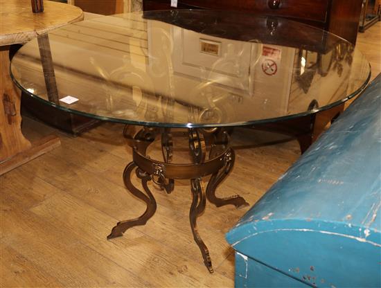 A bronzed metal glass top centre table W.220cm